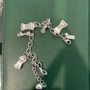 Kate spade silver permanent charm bracelet